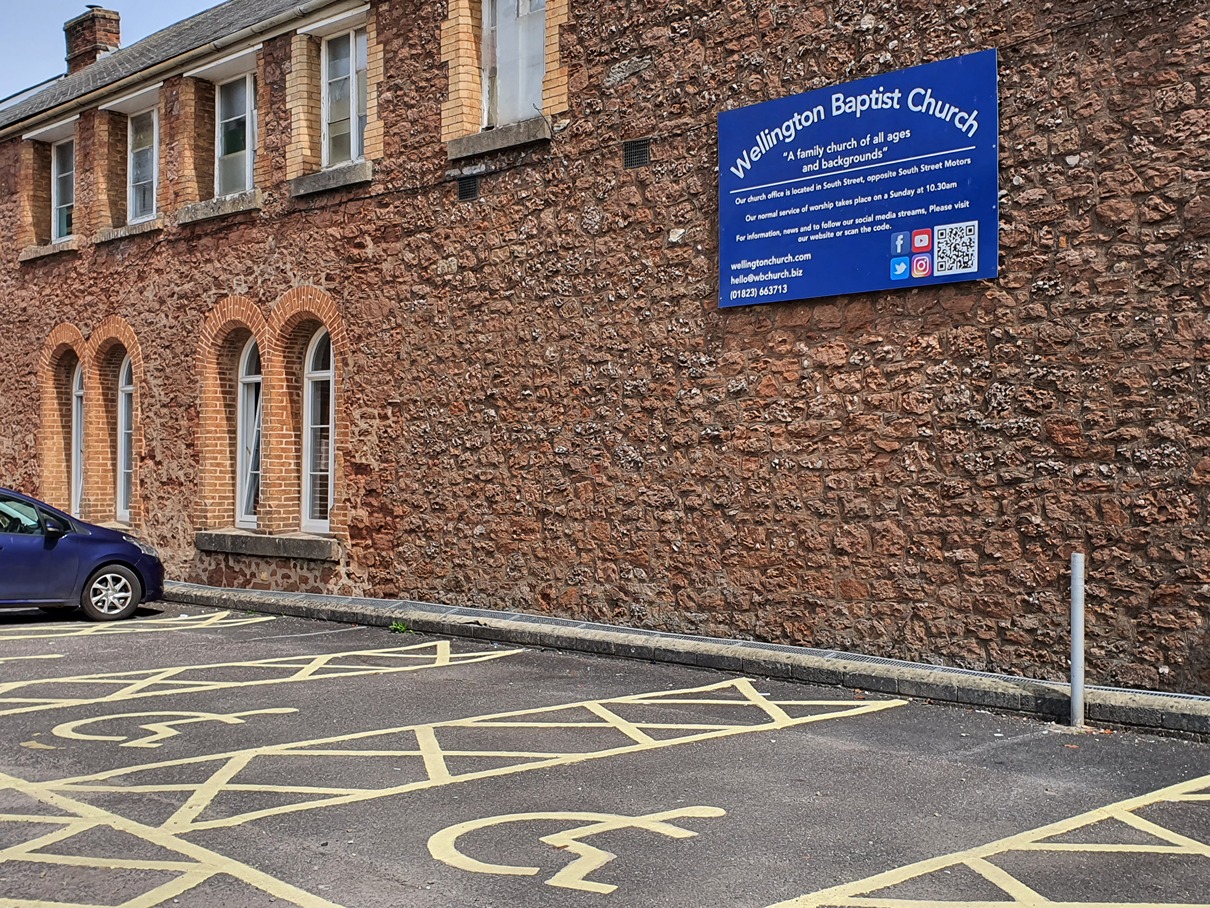 Showing four disabled car parking spaces that are available in South Street carpark directly behind the church next to the access to the church site