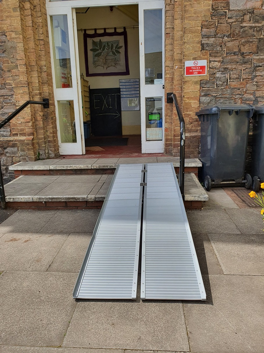 Metal ramps over steps to the main church hall entrance
